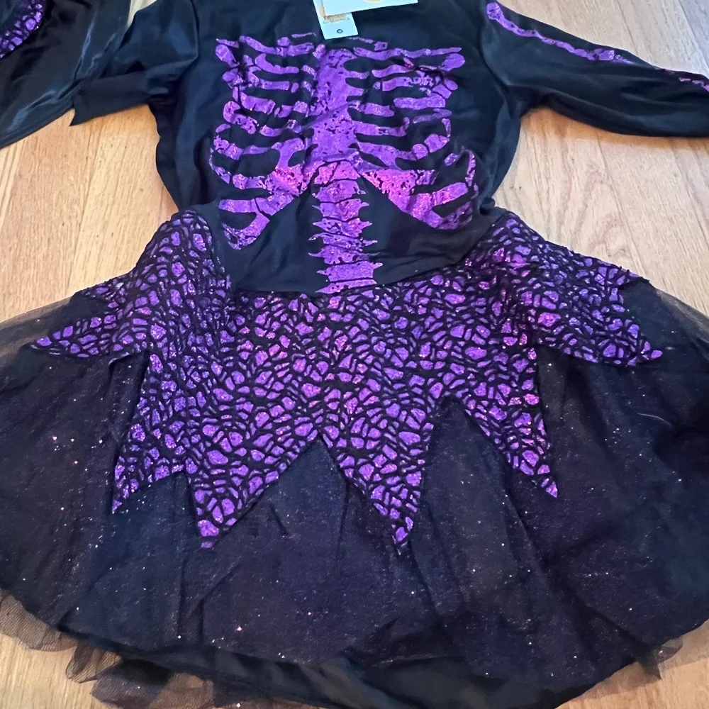 - purple glitter and black witch costume